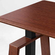 Ark Lite Standing Desk Detail, Close-Up of Woodgrain Surface and Beveled Edge, Ergonomic Desk.