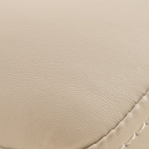 Off-White Pu Leather Upholstery Detail, Chester Dining Chair, Textured Surface.