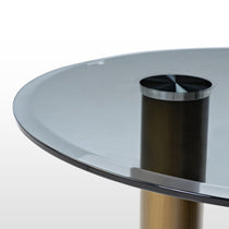 35 Brown Coffee Table With Bronze Finish, Glass Top, and Modern Design.