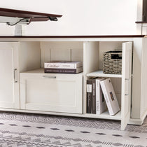 Eureka Ark Es Executive Standing Desk Cabinet Detail With Storage and Books, Including 'Cartier' and 'Vogue'.