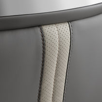 Close-Up of Royal II Office Chair Back Detail, Cream and Gray Leather With Ergonomic Design.
