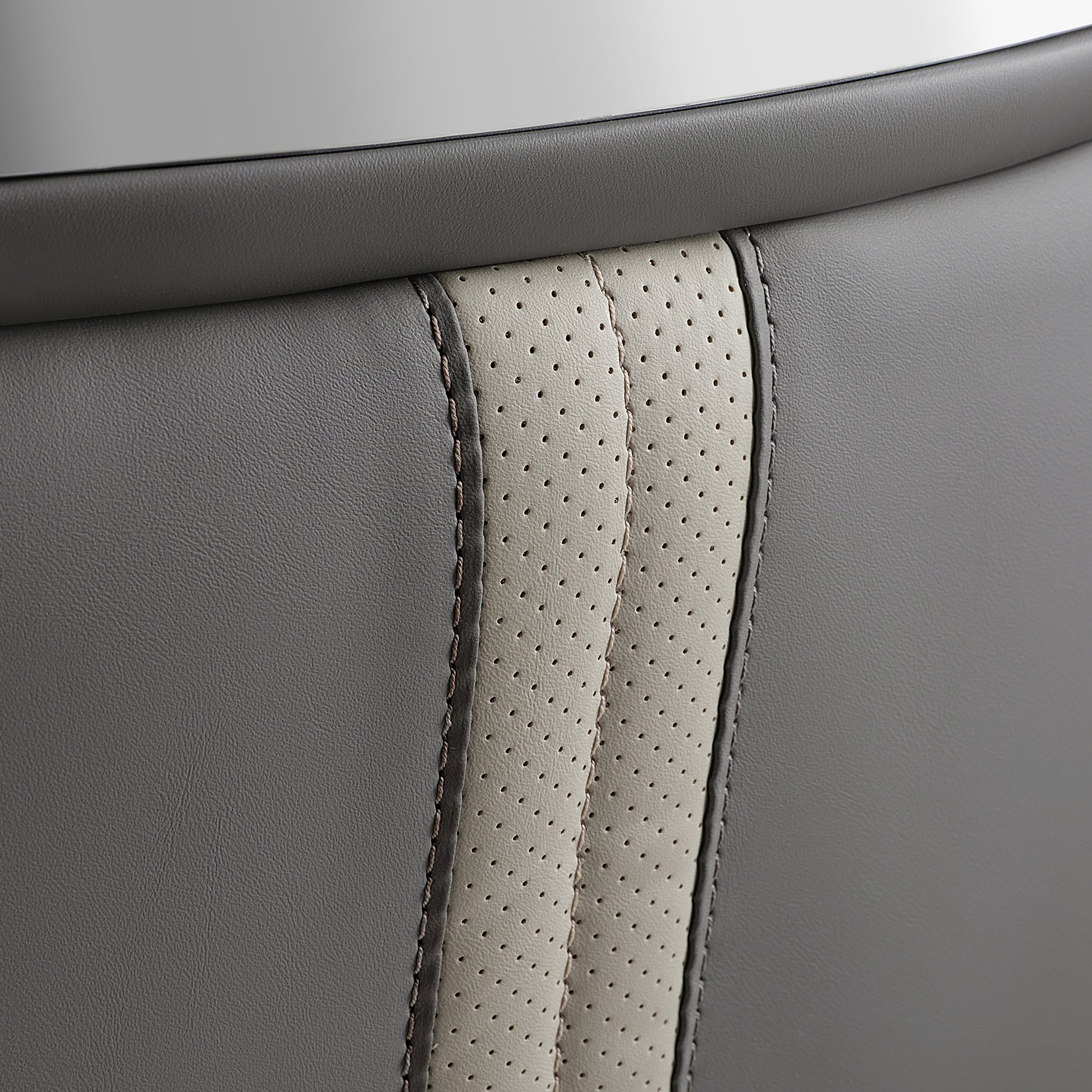 Close-Up of Royal II Office Chair Back Detail, Cream and Gray Leather With Ergonomic Design.