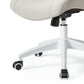 Close-up of caster wheels on beige Onyx Vera ergonomic office chair, beige