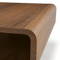 Eureka Ergonomic 47 Walnut Rounded Coffee Table Close Up, Showing the Curved Edge and Wood Grain Details.