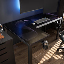 Eureka Ergonomic GTG L-shaped gaming desk: starry night, purple wave RGB, dual monitors, keyboard, mouse, cup holder, headphone hooks.
