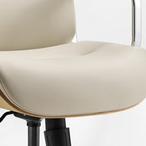 Eureka Ergonomic close-up of the beige Mathias Mason chair's seat cushion and oak side detail
