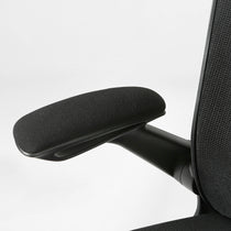Onyx Ergonomic Office Chair Detail: Black Padded Armrest, Mesh Back, Ergonomic Design.