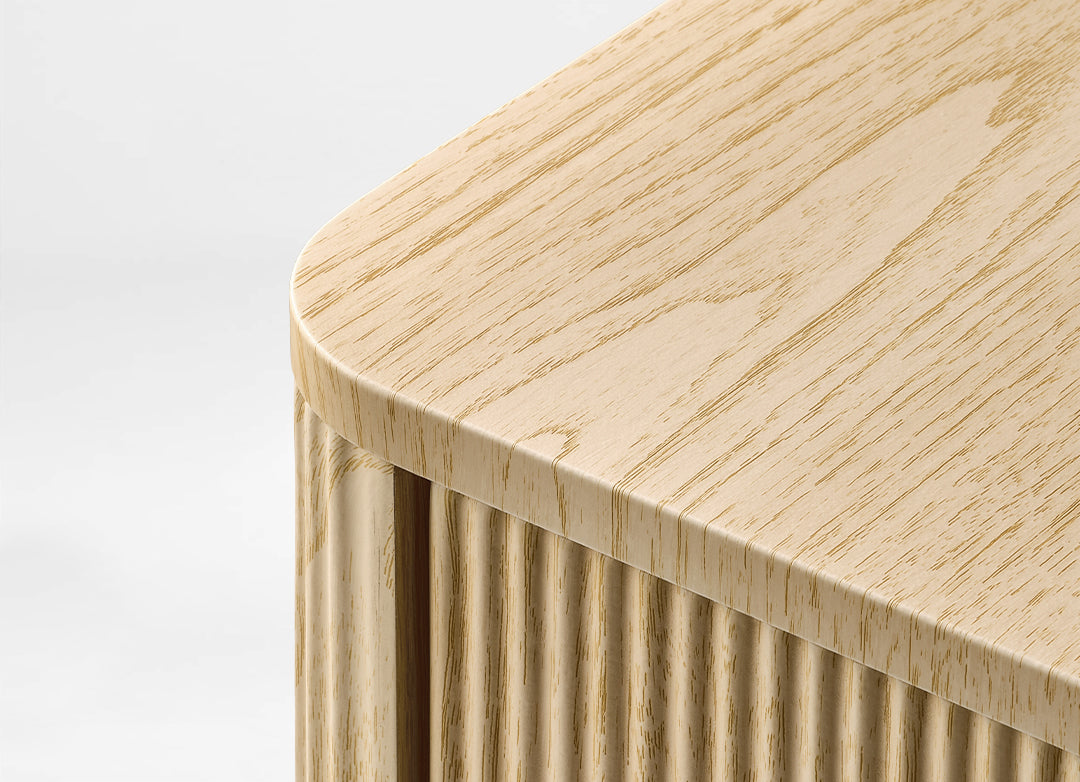 Eureka Ergonomic Aurelia file cabinet rounded top corner and light oak wood grain edge detail