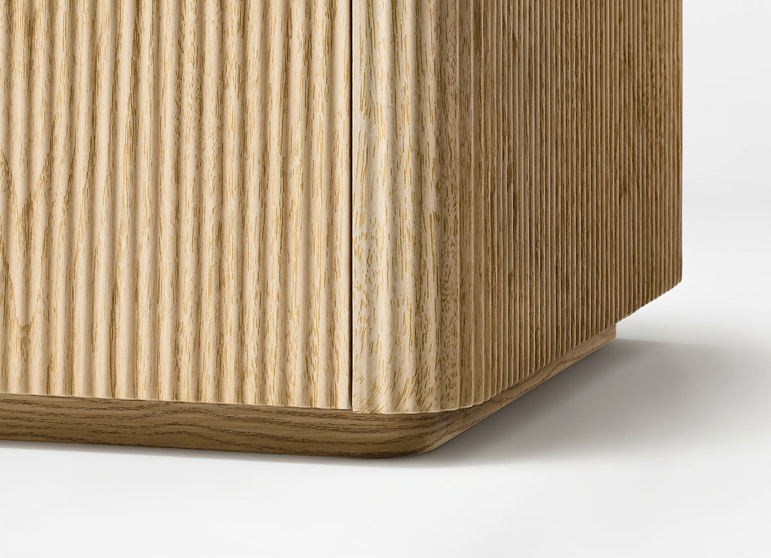 Eureka Ergonomic Aurelia file cabinet fluted side panel and rounded base in light oak detail