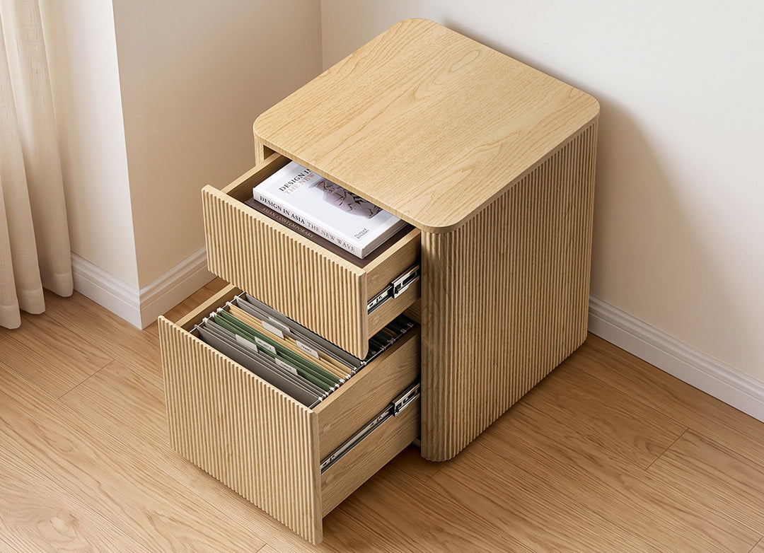 Eureka Ergonomic Aurelia file cabinet with two drawers open holding a book and hanging file folders