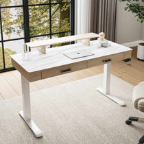 Eureka Ergonomic George Slate Standing Desk in Modern Home Office Setup With White Marble Desktop, Drawers, and Monitor Stand.