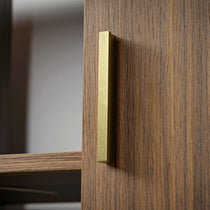 Napa Wood Bookcase Cabinet Detail: Brass Handle On Walnut Wood, Modern Storage Solution.