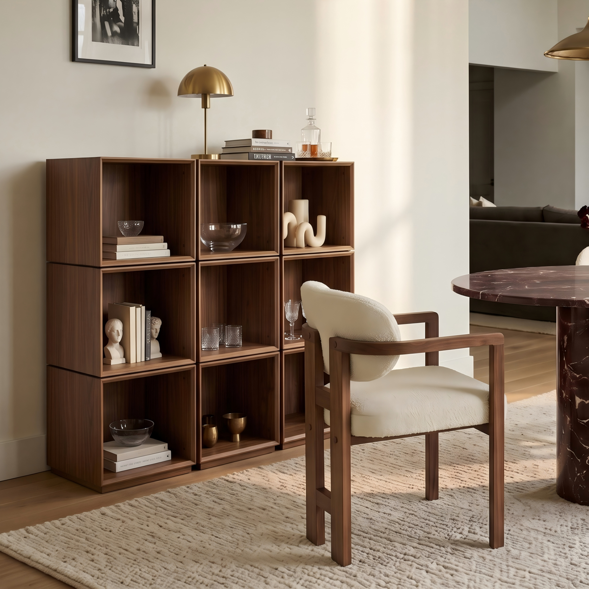Eureka Ergonomic Cubo walnut rotating storage cubes — three units placed side by side against the wall to form a nine-cube grid storage cabinet, styled in a warm-toned dining area.