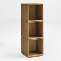 Eureka Ergonomic Cubo three-tier walnut rotating storage cabinet, empty open cubes from front three-quarter angle on white