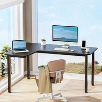 Black L-Shaped Office Desk With Triple Monitor, Laptop, and Ergonomic Chair - Eureka Ergonomic.
