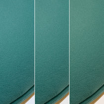 Emerald Green Velvet Upholstery Detail of Katalea Dining Chair Set, Showcasing Rich Texture and Color.