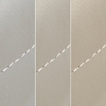 Chateau Dining Chair Detail: Off-White Upholstery With Decorative Stitching. Modern Dining Furniture.