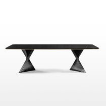 Eureka Ergonomic Oasis 105.5" dining table, black sintered stone top with white veining, supported by twisted black metal pedestal bases.