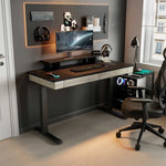 Ergonomic Home Office Setup With a 47 Electric Standing Desk, Monitor, Keyboard, and Gaming Pc, Wood Finish.