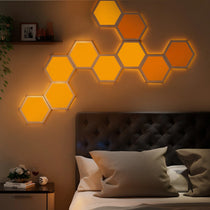 Lucet Art Lighting - Modern Bedroom With Hexagon Lights Above a Bed.