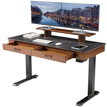 Eureka Ergonomic George Slate Standing Desk With Dual Monitors, Drawers Open, Modern Home Office Setup.