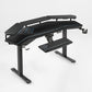Eureka Ergonomic Aero Pro Wing-Shaped Standing Desk Setup With Accessories, Ergonomic Design, and Monitor.