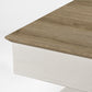 Eureka Ergonomic Ark SD Standing Desk  Desk corner with light woodgrain beveled edge and white frame.