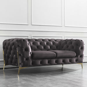 Beverly Loveseat Sofa With Navy Velvet Upholstery and Rose Gold Legs.