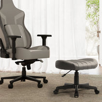 Grey Ergonomic Office Chair and Footstool With Wheels for Home Office Comfort.