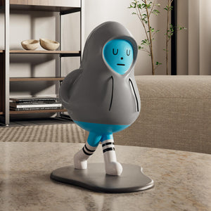 HD-05 Monster Ornament in a Modern Living Room. Blue Face With Grey Hoodie. Decorative Figurine to Brighten Up Any Space.