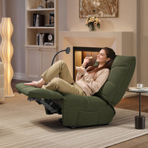 Woman Relaxing in Green Linx Power Glider Recliner With Wireless Charging, Enjoying a Snack in Modern Living Room.