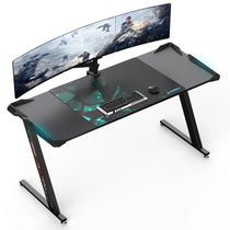 Eureka Ergonomic Z-Shaped Gaming Desk With Carbon Fiber Surface, Rgb Lighting, and Curved Monitor.