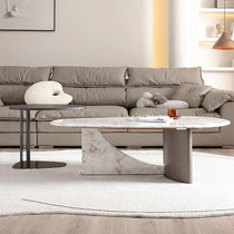 Contemporary Side Tables With Marble Top and Wood Base in Modern Living Room Setting.