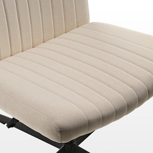 Close-Up of Cream Linen-Blend Fabric On Adena Swivel Lounge Chair, Highlighting Texture and Stitching Details.