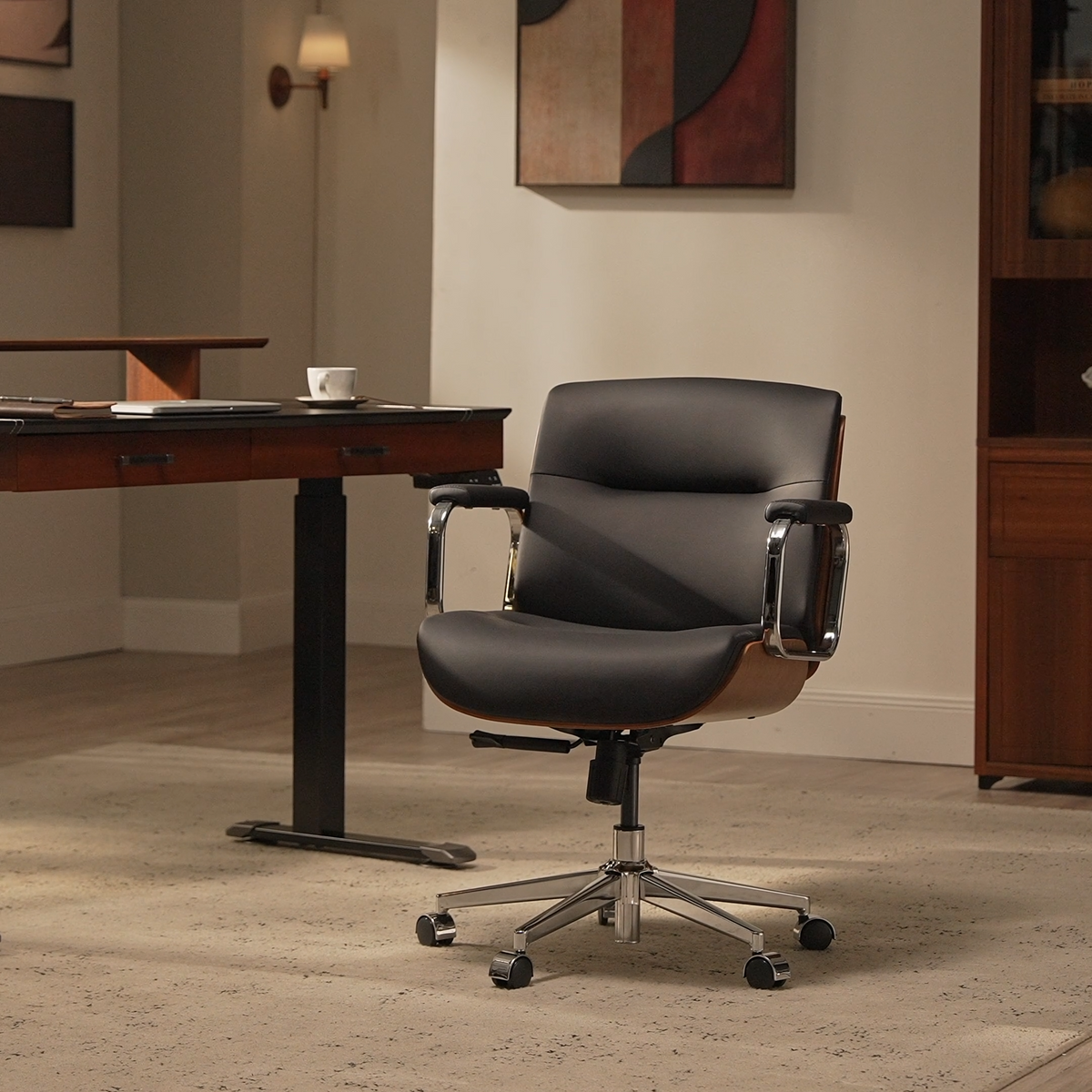 Eureka Ergonomic black Mathias Mason low back office chair in a modern office, shown in a video preview